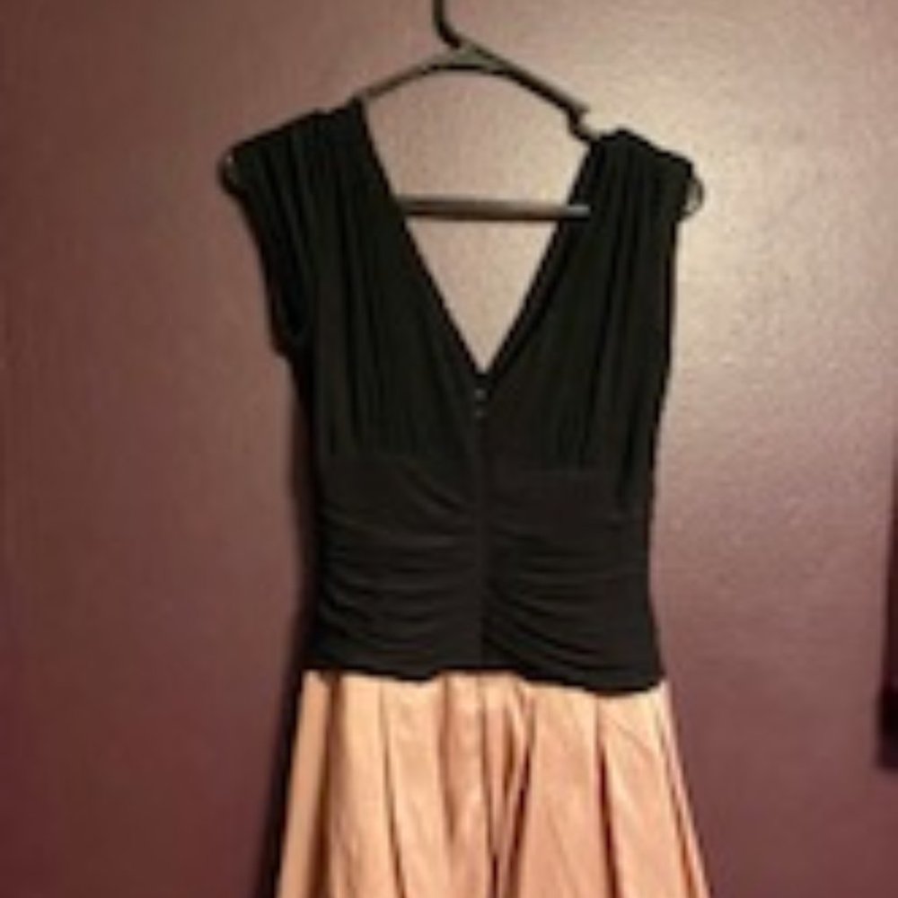 Dress by J.R. Nites Pink and Black wore onetime for a wedding.